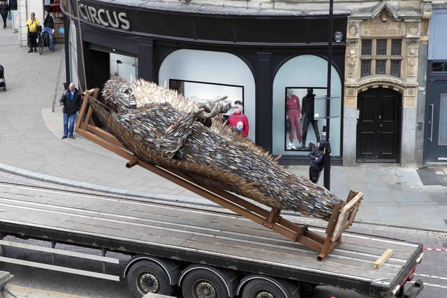 A huge crane hoisted the Knife Angel off the lorry and into position outside All Saints' Church