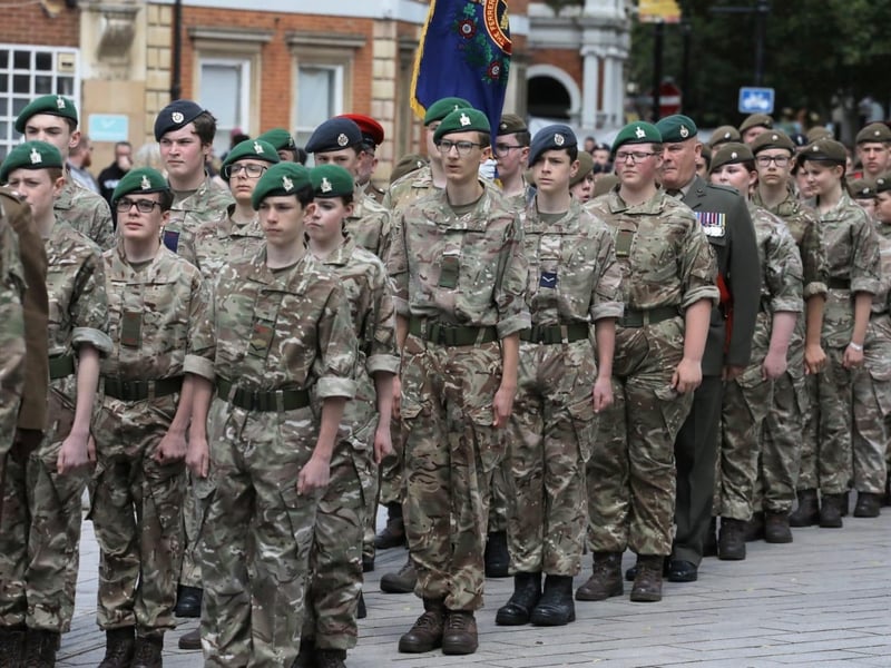 Kettering town centre: crowds line town centre to welcome The Royal Anglian Regiment for Armed Forces Day parade /National World