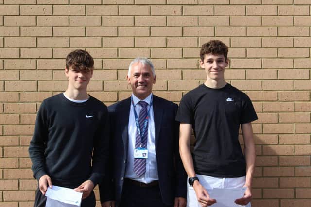 Mr Frazer with Harry Railton (left) and Arthur Tilt (right). Both students achieved top results.