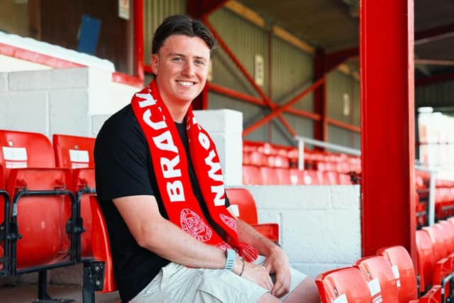 George Harmon is Brackley Town's seventh signing of the summer.