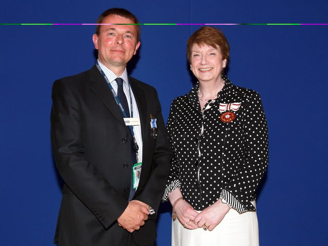 2013 - Northamptonshire Police Long Service awards ceremony takes place at their Headquarters, Wootton Hall, Northampton. Sgt Steven Henderson, presented by Deirdre Newham.