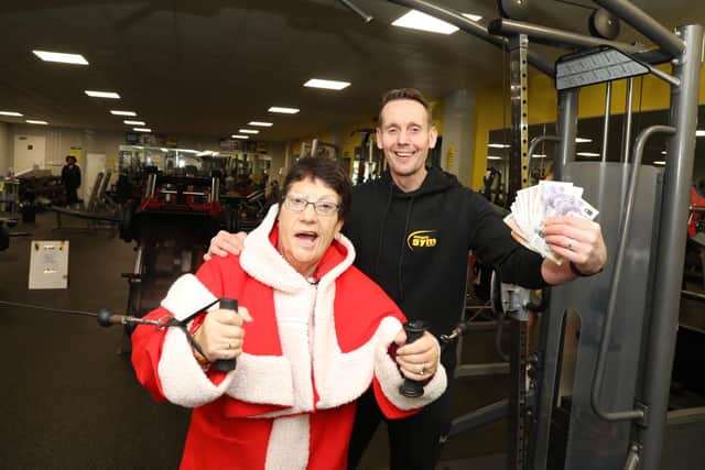 Mother Christmas, Jeanette Walsh, with manager of Simply Gym Tony Hough