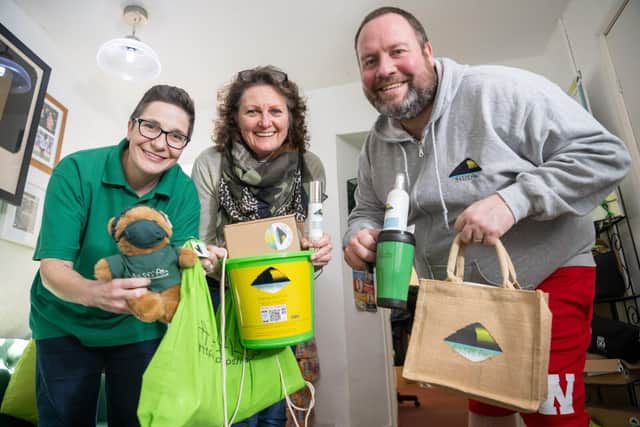 BN - SGB-33483 - Staff from Ailsa's Aim holding some of the items the charity provides