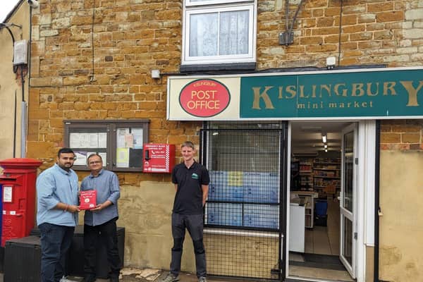 Mike Dowson, Founder and MD of Turtle, at Kislingbury Post Office, Northamptonshire with an installe