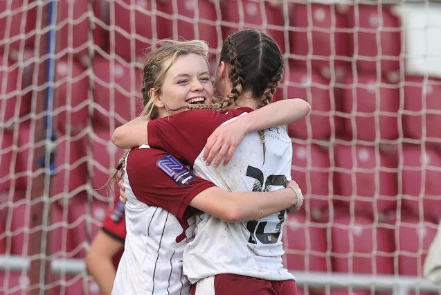 Beth Artemiou celebrates with team-mate Alex Dicks.