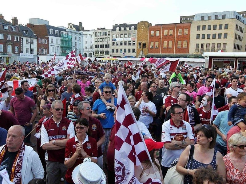 Cobblers fans celebrate the club's 2020 League Two play-off final win over Exeter City.