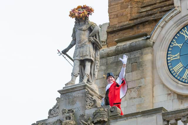 The Mayor of Northampton hangs the garland on the statue of King Charles II. Picture: Stu Vincent Photography