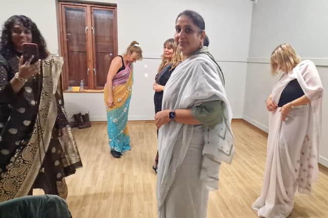 Learning to drape the saree