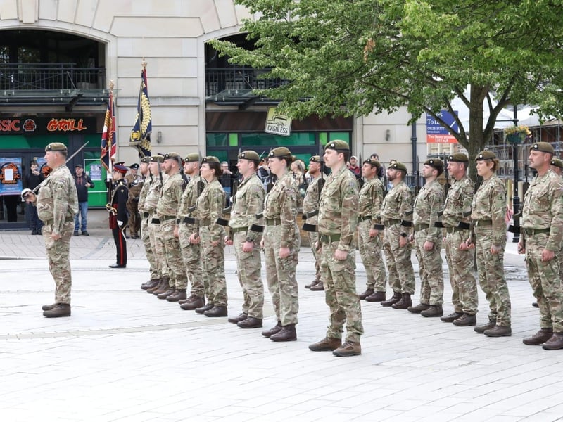 Kettering town centre: crowds line town centre to welcome The Royal Anglian Regiment for Armed Forces Day parade /National World