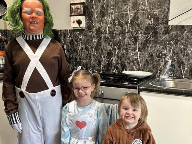 Henry, aged 10, as an Oompa Loompa, Primrose, age four, as Goldilocks and Beau, aged two, as the Gruffalo.