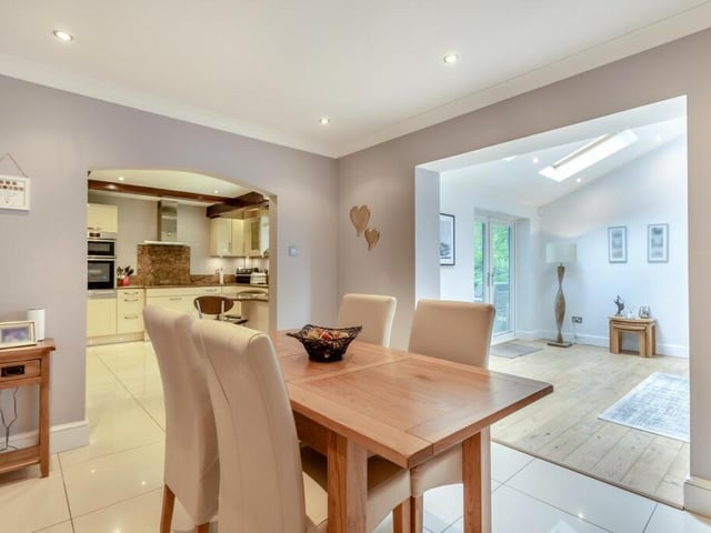 The breakfast room has easy access to the kitchen, as well as another reception room which leads out into the garden