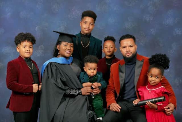 Mellonia Gray pictured at graduation with her family.