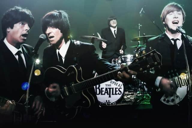 The Upbeat Beatles promise faithful renditions of Fab Four classics