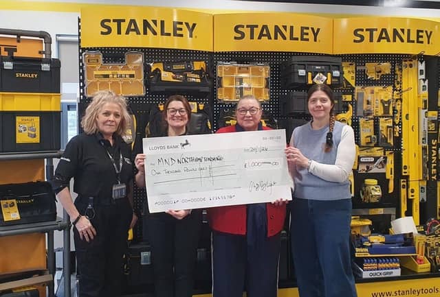 Cheque presentation to MNDA at a recent BID event hosted by Stanley, Black & Decker