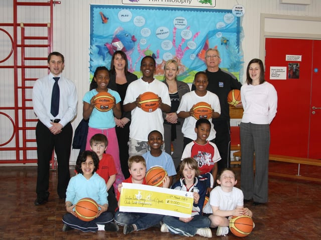 2009: Weston Favell School receiving the Awards for All grant National Lottery funding to set up a programme to bridge the gap between local sports clubs and their feeder primary schools. Martin Spencer was the school sports co-ordinator at Weston Favell School (dressed in blue holding basketball).