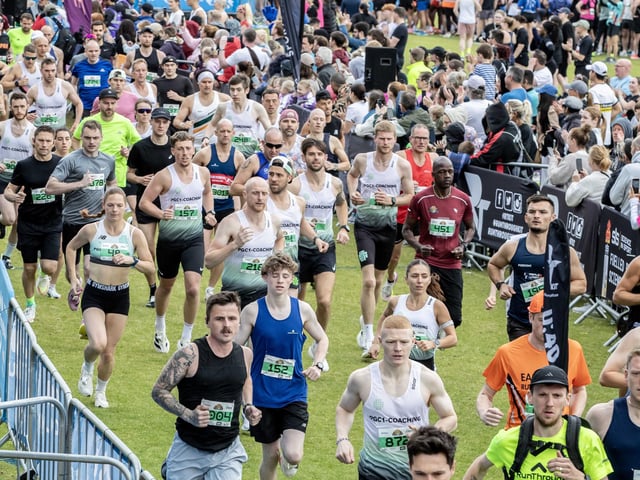 Hundreds of runners braved showers and wind to take on the race on Sunday (May 25), which started and finished at Sixfields stadium.