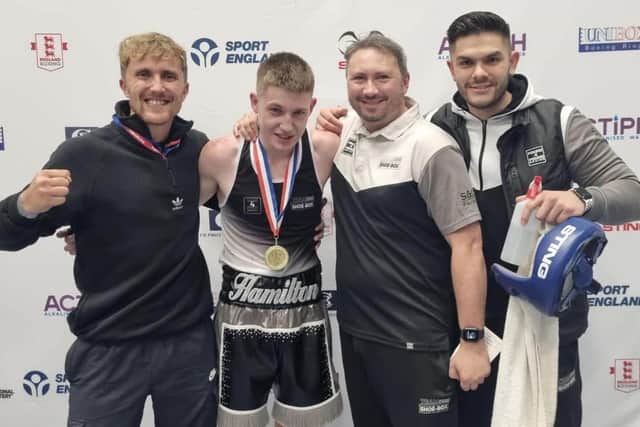 Charlie Hamilton celebrates his win with the Shoe-Box team