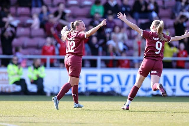 Kim Farrow celebrates with Jemima Footitt after scoring her side's second goal during the FA Women's National League Division One Midlands match between Northampton Town and Lincoln United at Sixfields on March 09, 2025 in Northampton, England. (Photo by Pete Norton/Getty Images)
