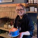 Jayne Catherine, known as the Latte Lady, is a barista at Lawrence's Coffeehouse.