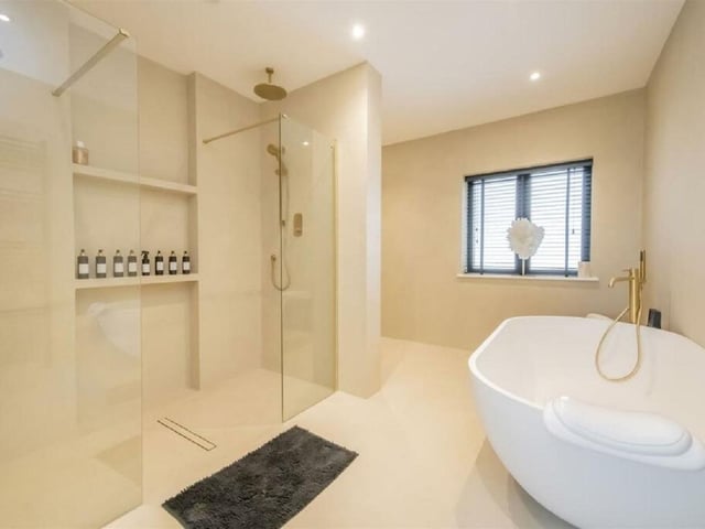 Just one of five exquisite bathrooms features in the home
