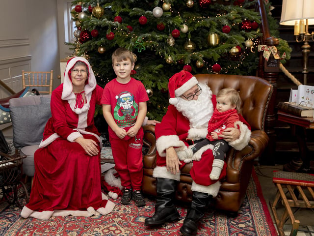 Children meet Father Christmas at Delapre Abbey in December 2022.