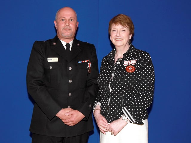 2013 - Northamptonshire Police Long Service awards ceremony takes place at their Headquarters, Wootton Hall, Northampton. Special constable Steve Morrow, presented by Deirdre Newham.