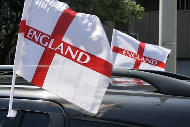 Faulty flag flying from cars breaches a host of laws