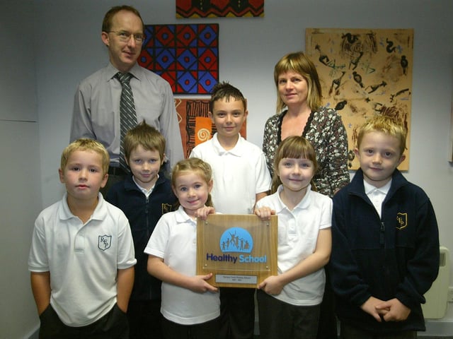 2007: Rectory Farm Primary School with their Healthy Schools award. Pictured: Michael Snelson, headteacher and Sue Gardner, deputy head, with members of the school council.
