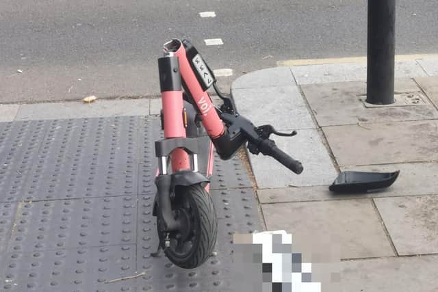 A damaged e-scooter at the scene of Thursday's crash in Northampton which left a rider seriously injured