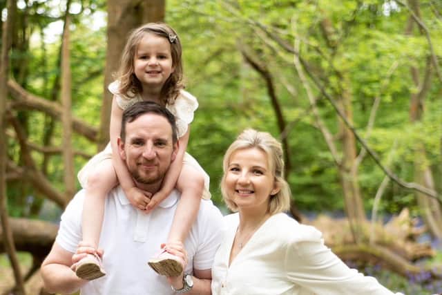 Tor with her husband Joe and daughter Isla. Photo: Sophie Last Photography.
