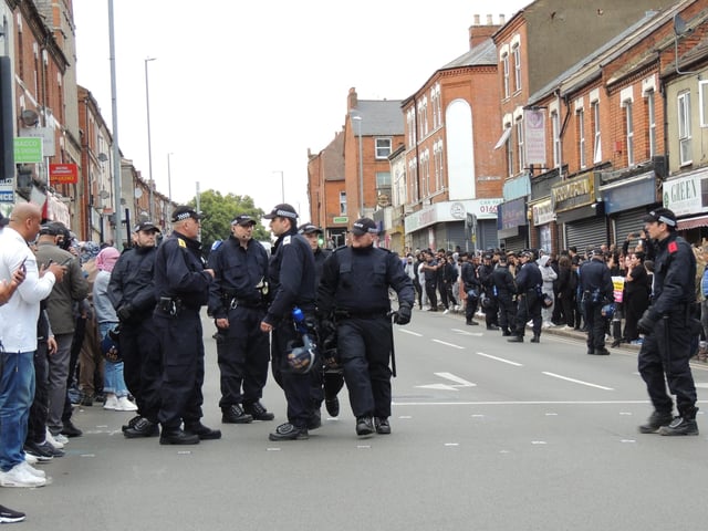Hundreds have gathered in Kettering Road this evening from 7pm with a peaceful counter-protest