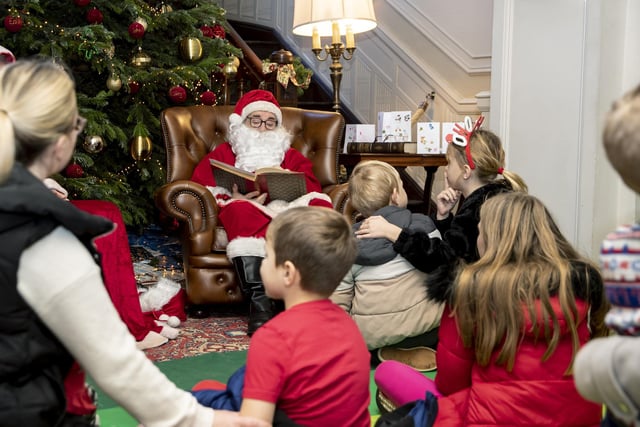 Children meet Father Christmas at Delapre Abbey in December 2022.