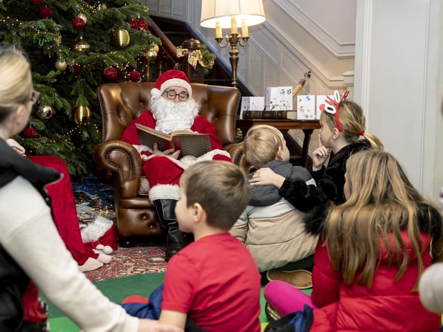 Children meet Father Christmas at Delapre Abbey in December 2022.