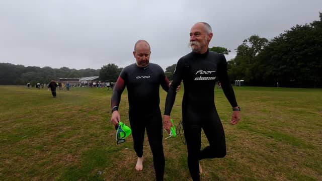 Steve and his guide Andy as they walk to the open water swim