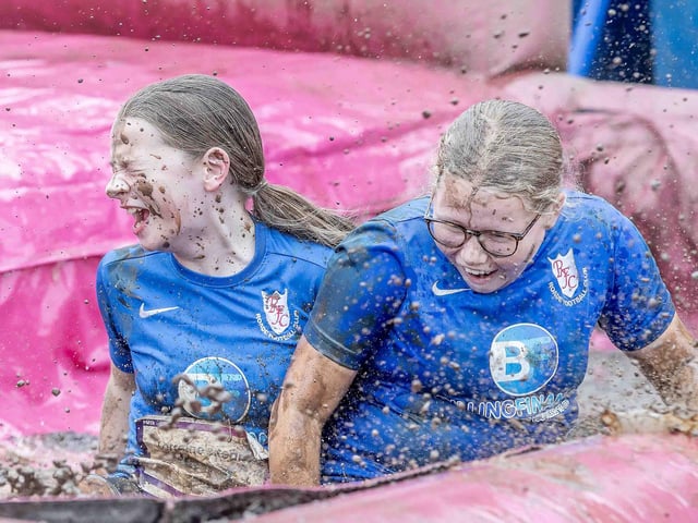 All smiles as participants tackled obstacles during Race for Life's Pretty Muddy on Saturday July 13, 2024 in Abington Park.