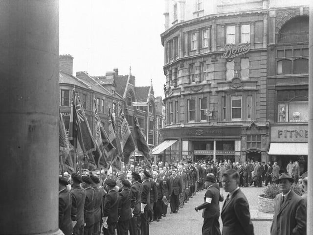 Remembrance parade early 1960s All Saints Church Northampton showing Boots and Gold Street