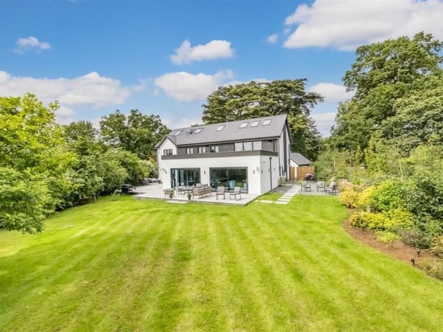 Outside there is a mature and private south-facing garden