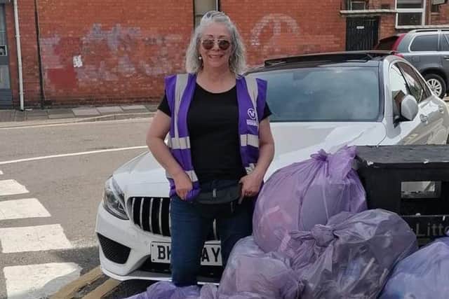 Eight volunteers, including three residents who actively pick litter, took to the streets on Friday to make a positive impact.