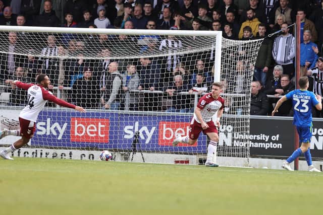 Sam Hoskins celebrates after scoring for the Cobblers in their 2-1 defeat to Grimsby Town on Saturday (Picture: Pete Norton)
