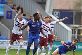 Cobblers player appeal for a foul during Saturday's game against Shrewsbury. Picture: Pete Norton