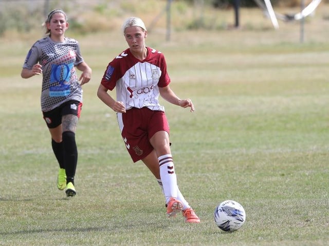 Ella Bailey passes to a team-mate.