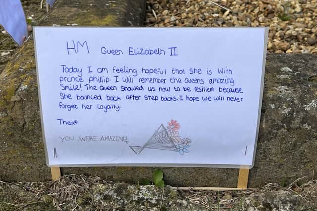 As part of their reflection, the children wrote down messages to The Queen and the words and pictures have been displayed on the Naseby Lion Memorial.
