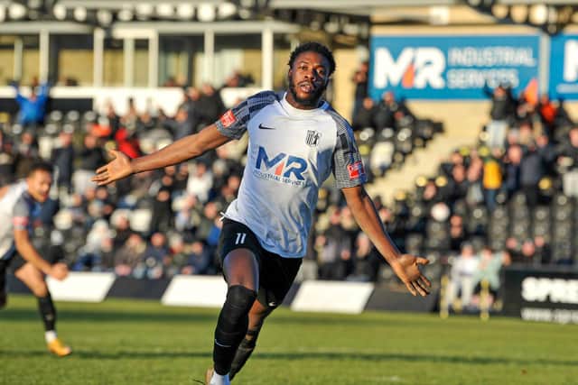 Hilton Arthur celebrates after scoring Corby Town's winner in their 2-1 success over Daventry Town. Pictures by Jim Darrah