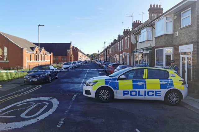 Police officers have been guarding the scene in Southampton Road, Northampton