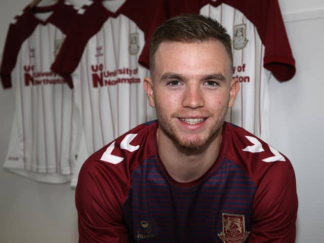 Happy to be here... new Cobblers loan signing Marc Leonard