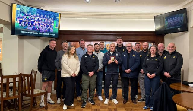 Volunteers, coaches and players from the Casuals met with Bill Sweeney