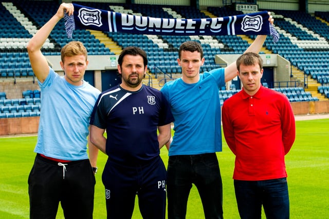 An impressive triple signing by Paul Hartley. Although it appears Greg Stewart, Paul McGinn and Paul McGowan have won a competition to meet the manager.