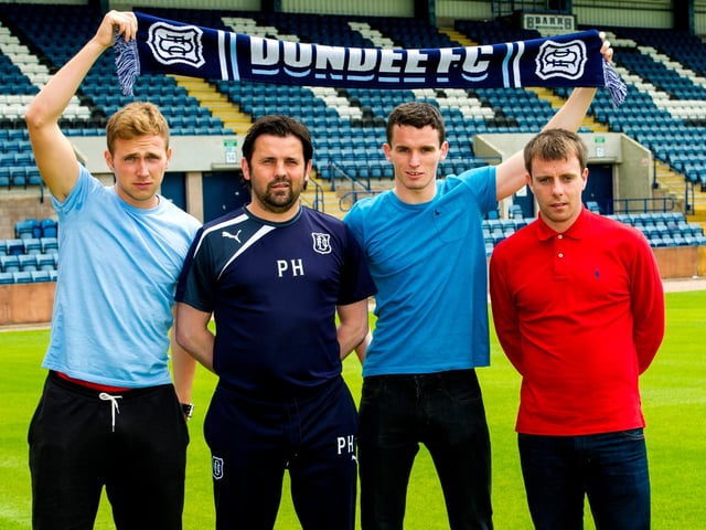 An impressive triple signing by Paul Hartley. Although it appears Greg Stewart, Paul McGinn and Paul McGowan have won a competition to meet the manager.