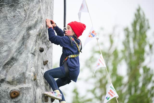 With around 430 set to enjoy the team games, crafts, climbing, campfire foods and party atmosphere, this accounts for half of the young people scouting across the town. Photo: Dave Bird.