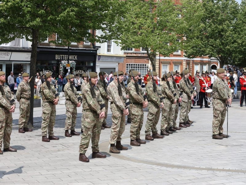 Kettering town centre: crowds line town centre to welcome The Royal Anglian Regiment for Armed Forces Day parade /National World
